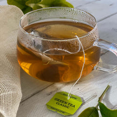 Close-up of Bigelow Classic Green Tea tea bags in foil pouches preserving freshness