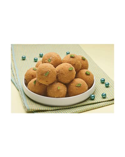 Bikaji Besan Ladoo slow-roasted in desi ghee aroma on display.