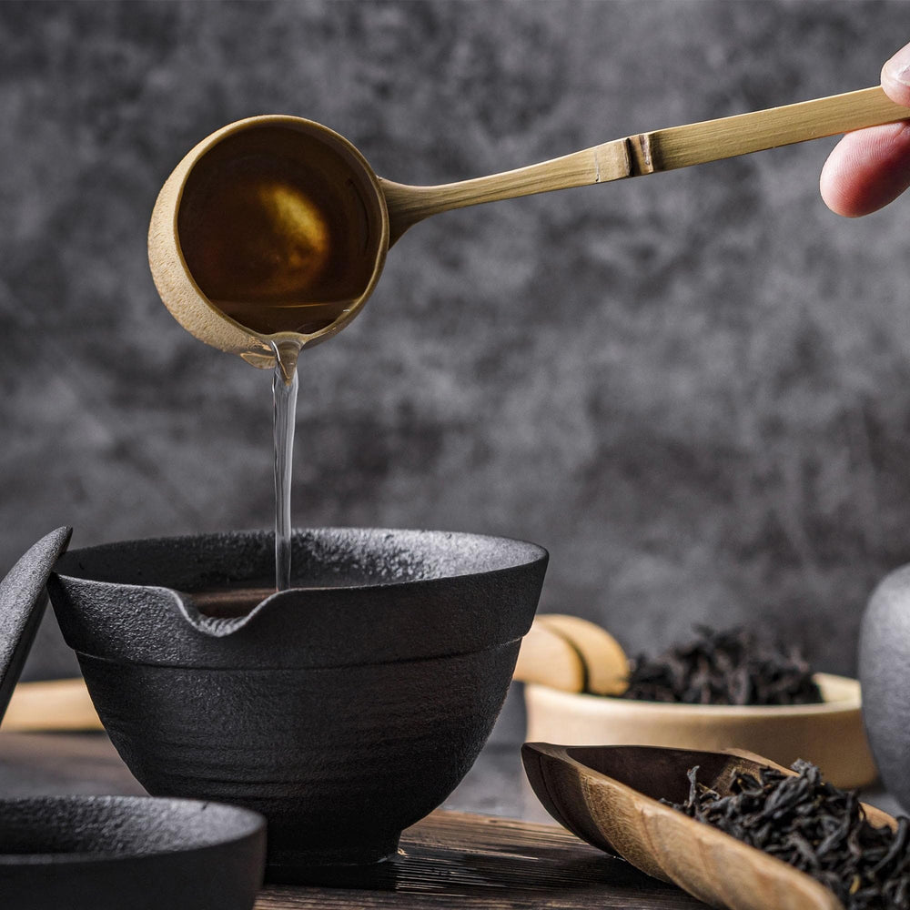 Biokoma measurement of teaspoon dosage diluted in water or tea.