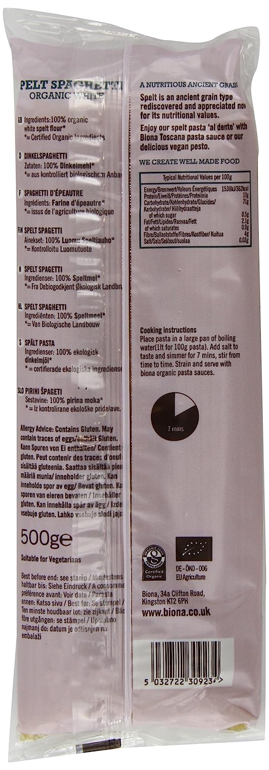 Biona organic white spelt spaghetti uncooked on wooden board; ideal for quick weeknight meals.