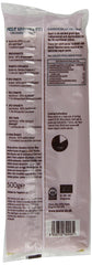 Biona organic white spelt spaghetti uncooked on wooden board; ideal for quick weeknight meals.
