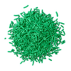 Birch & Meadow Green Sprinkles on a cake for festive decorating.