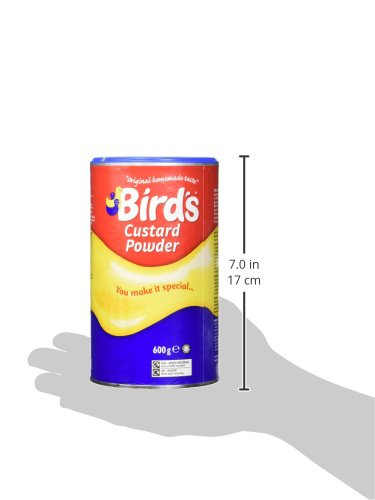 Bird's Vanilla Custard poured over dessert for serving