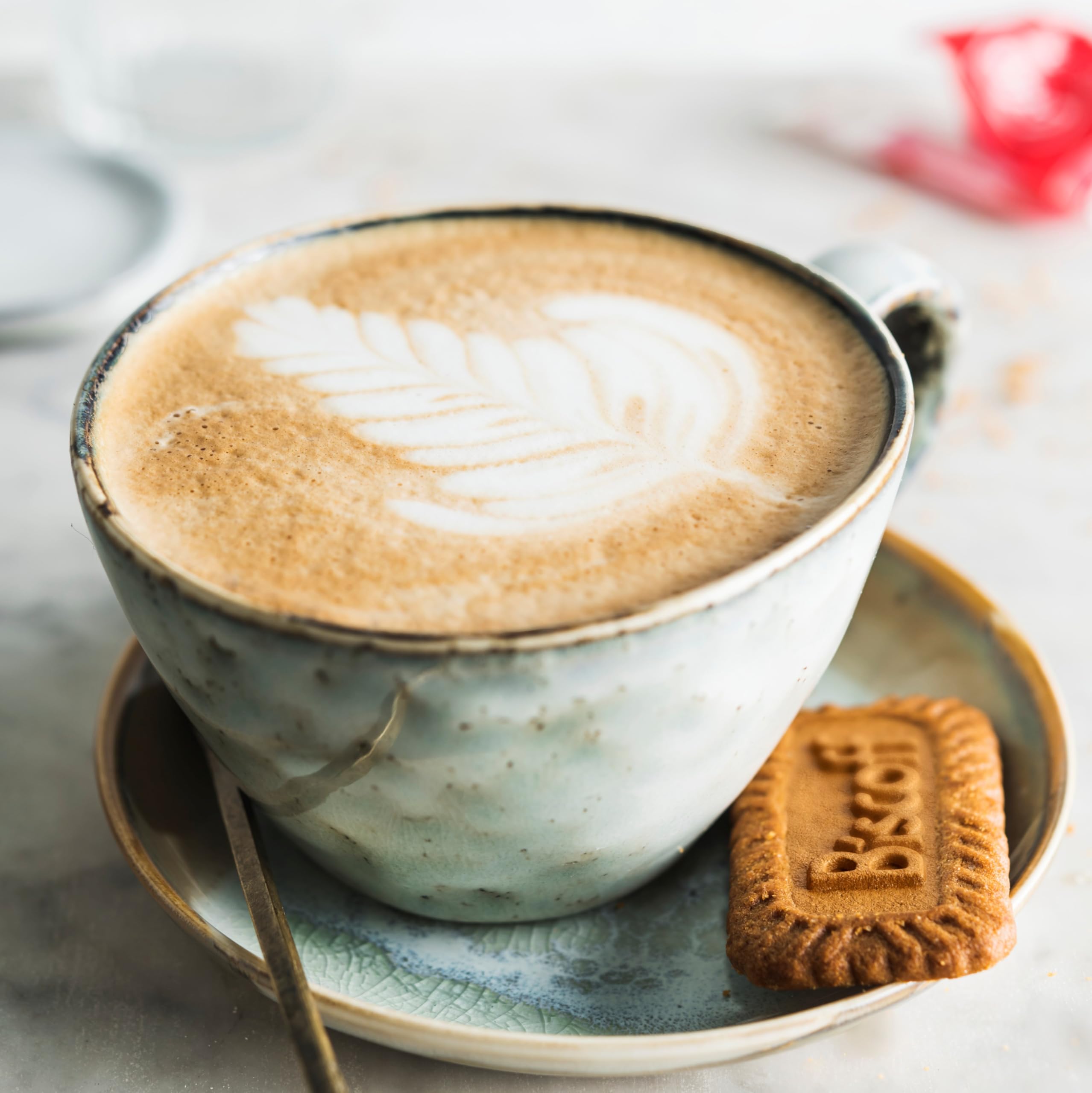 Biscoff cookie cross-section reveals crunchy texture and caramel center.