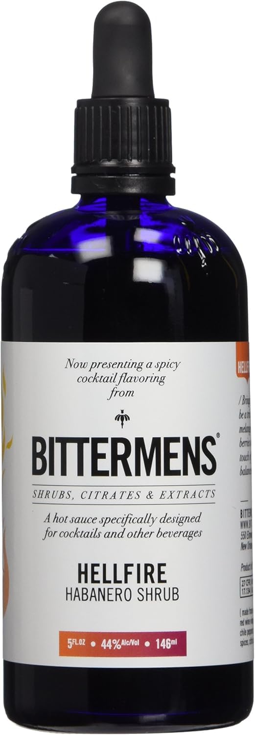Bittermens Hellfire bottle close-up highlighting spicy, balanced flavors for cocktails.