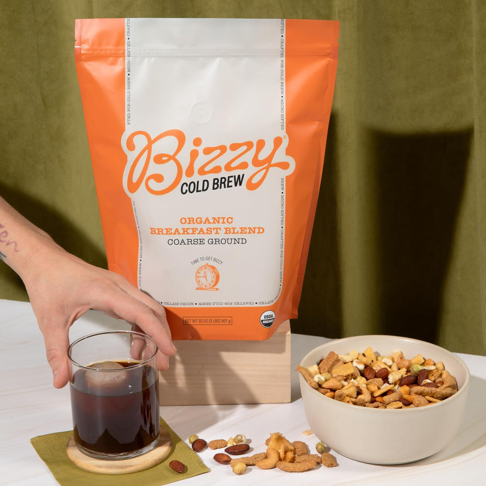 Bizzy Organic Cold Brew being prepared in a pitcher for customizable strength.