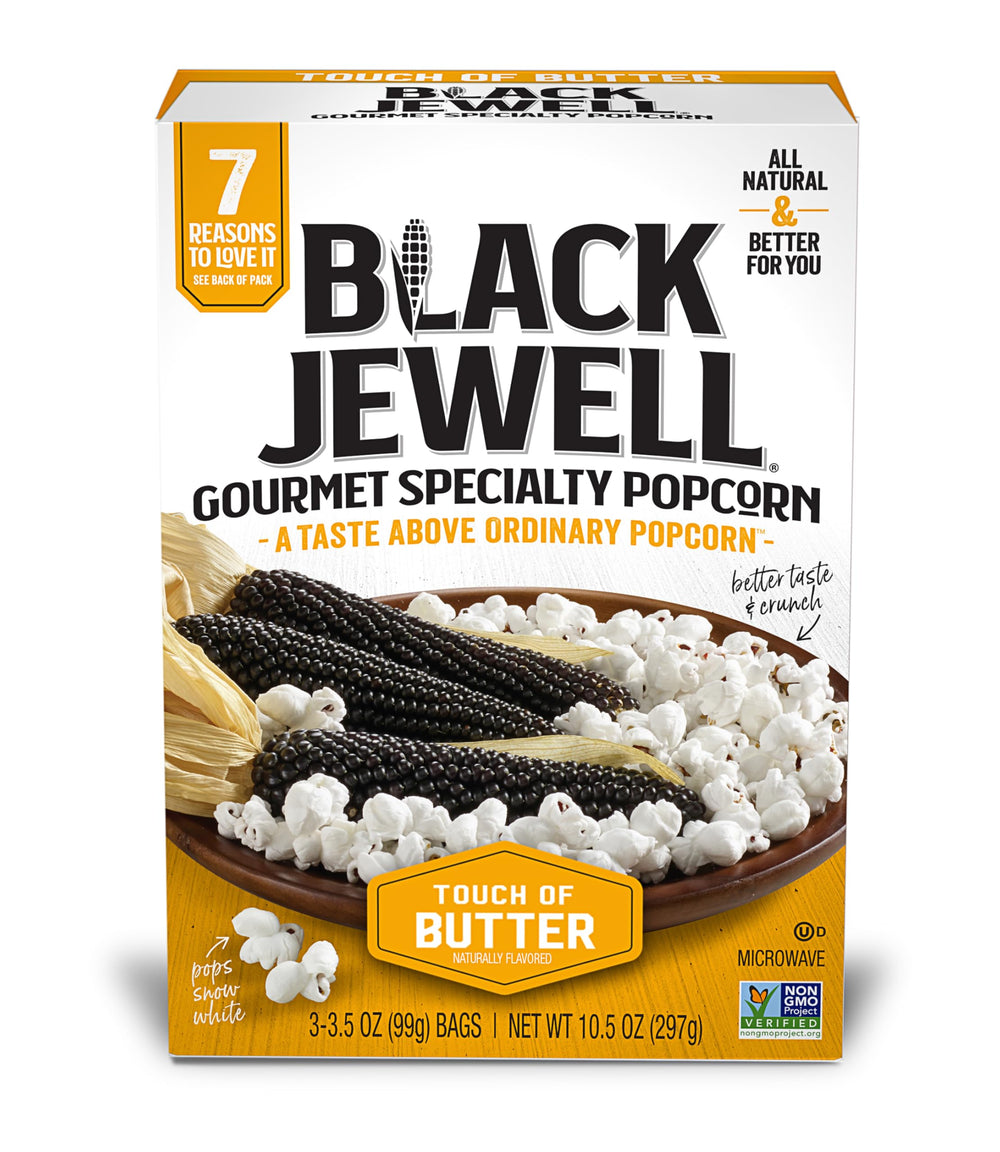 Black Jewell popcorn kernels close-up, signaling premium snow-white pop for movie nights.
