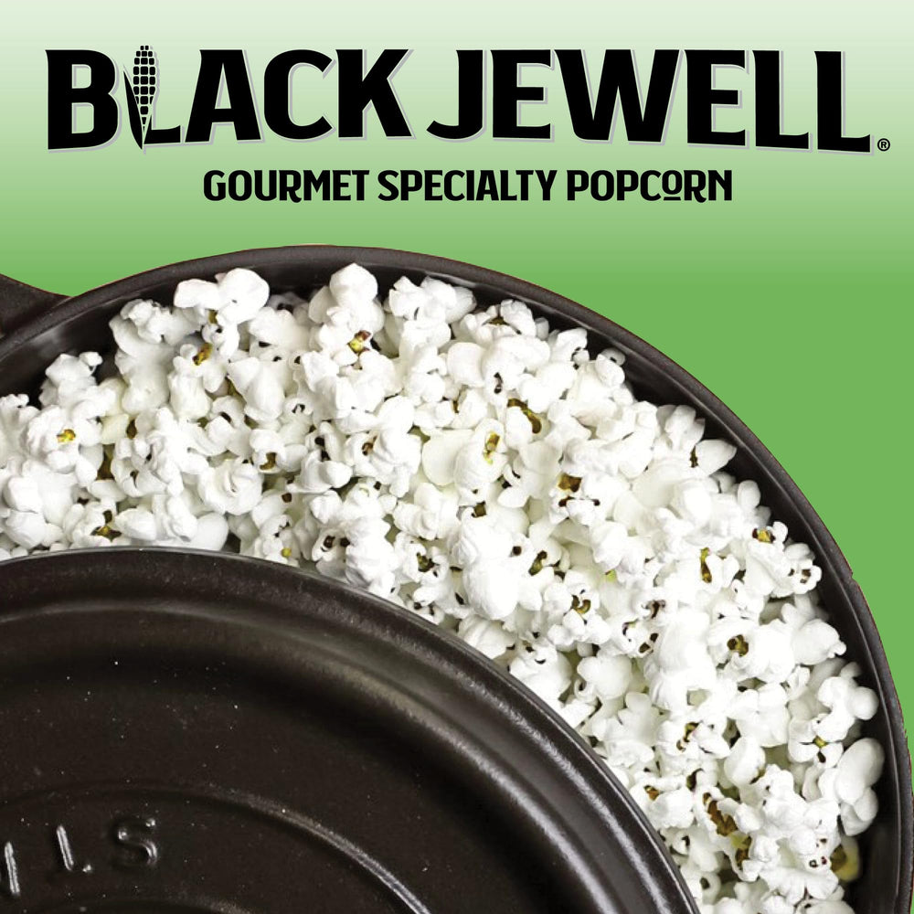 Measuring scoop with kernels in a bowl, Black Jewell Original Black ready to pop for cozy evenings.