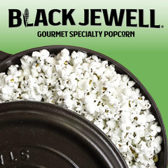 Measuring scoop with kernels in a bowl, Black Jewell Original Black ready to pop for cozy evenings.
