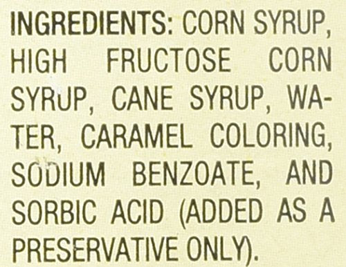 Pouring Blackburn's syrup over waffles adds golden sweetness and aroma.