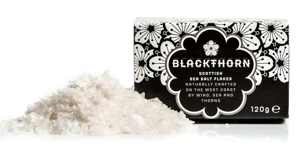 Blackthorn salt flakes on table with dust-free shaker for finishing touch