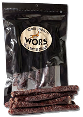Bledie Lekker Droewors 8oz pack on a rustic board, ideal for portable snacking.