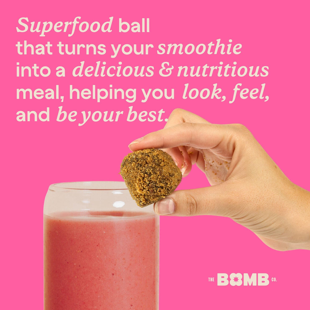 Blender Bombs OG bottle on kitchen counter signaling convenient vegan nutrition