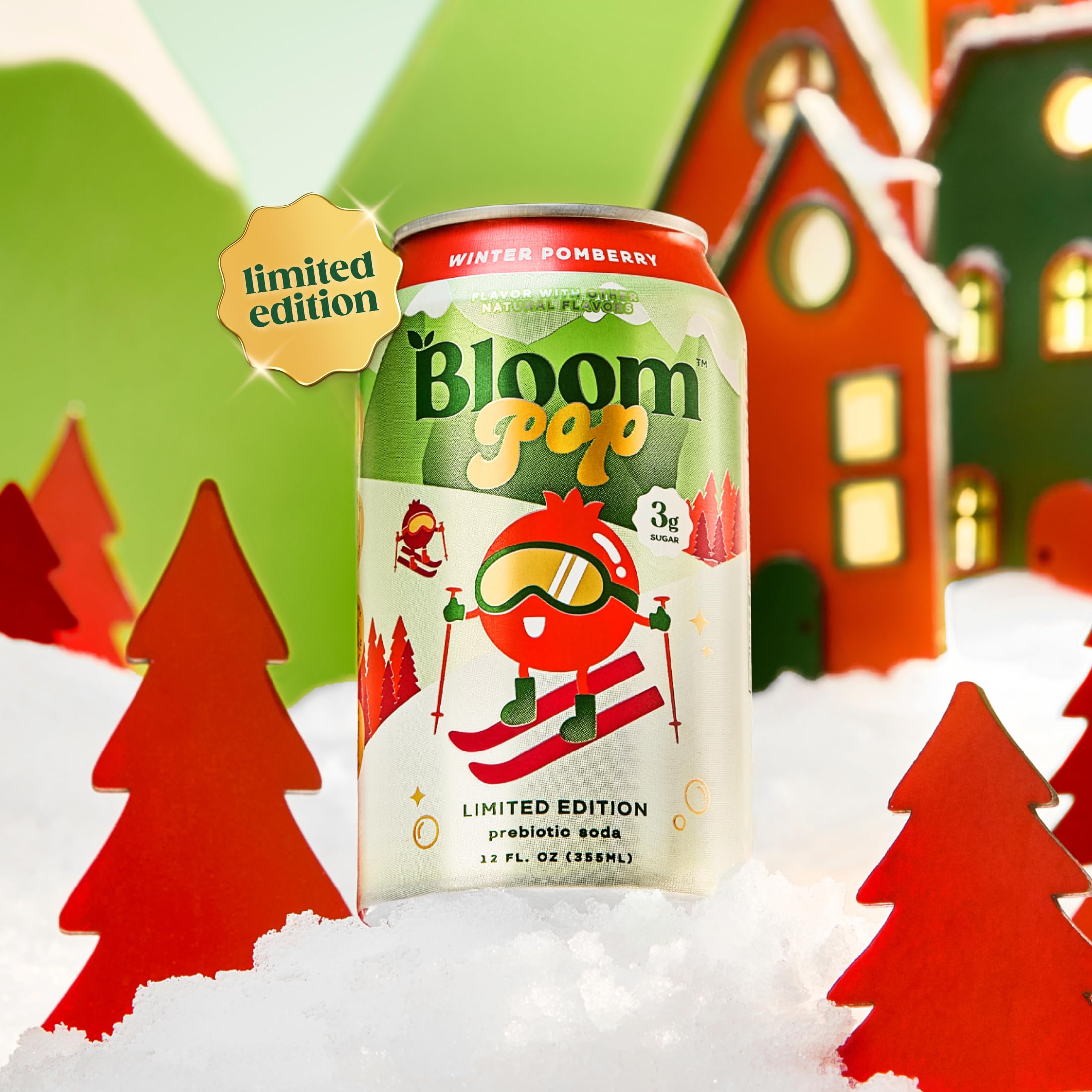 Lifestyle scene with hands holding Bloom Pop Winter Pomberry can in cozy kitchen.