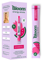 Bloom Nutrition energy drink stick packets dissolving in water for a zero-sugar energy boost