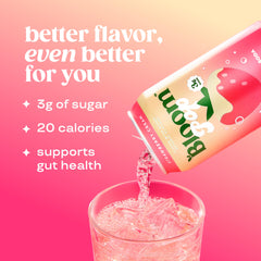 Pouring Bloom Pop Strawberry Cream into a glass to enjoy a refreshing aroma and fizz.
