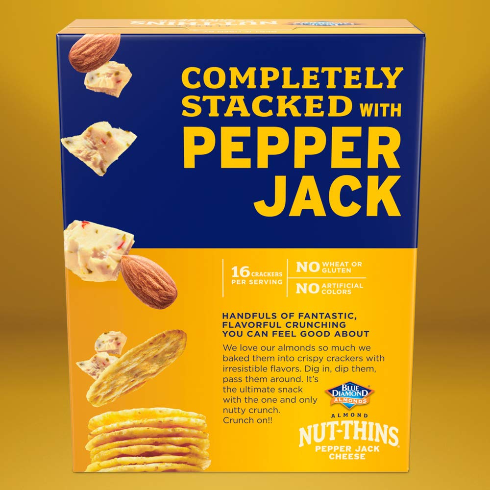 Hand holding a pack of Blue Diamond Nut Thins Pepper Jack