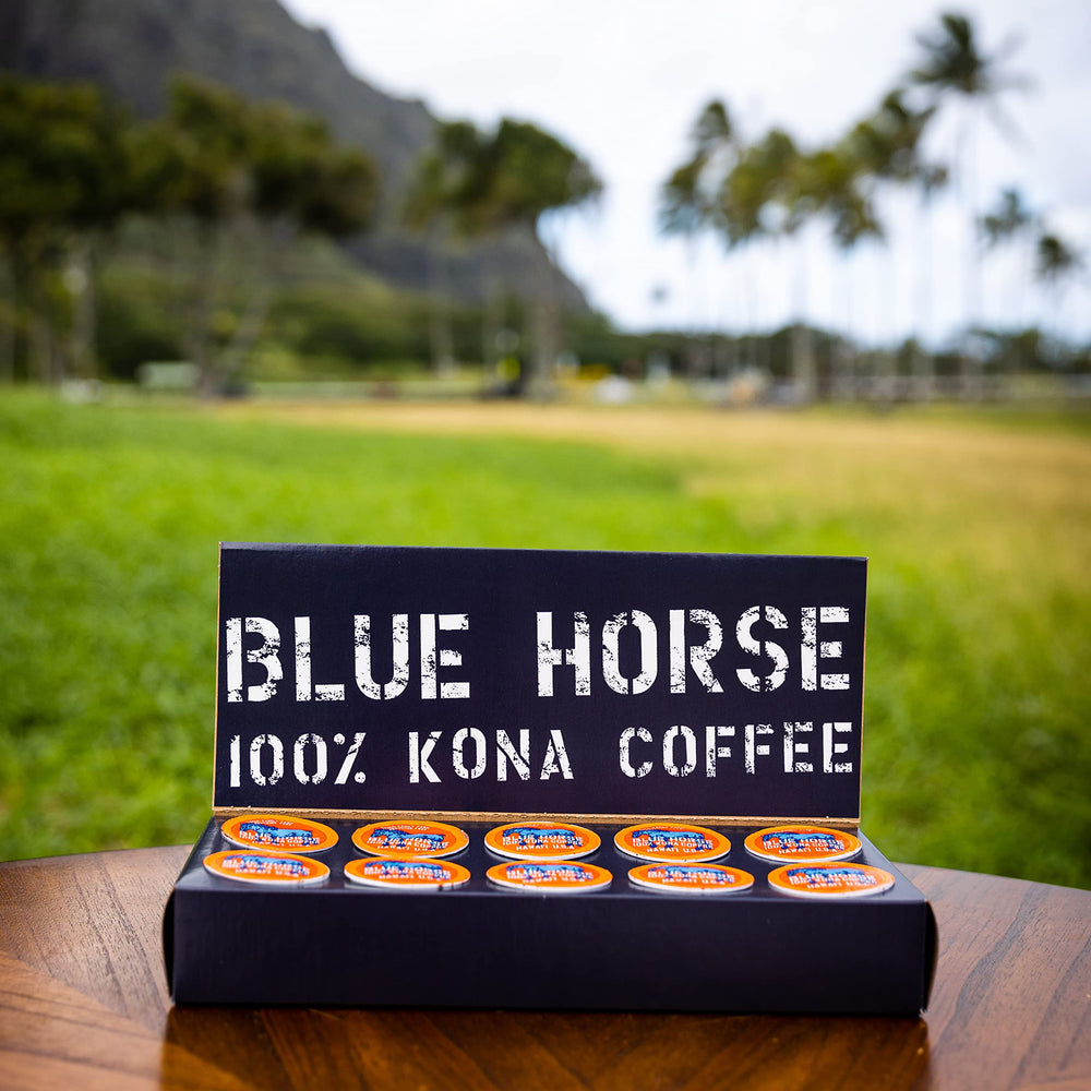 Blue Horse Kona Coffee farm-life scene illustrating shade-grown, handpicked harvesting on Hawaii's Big Island.