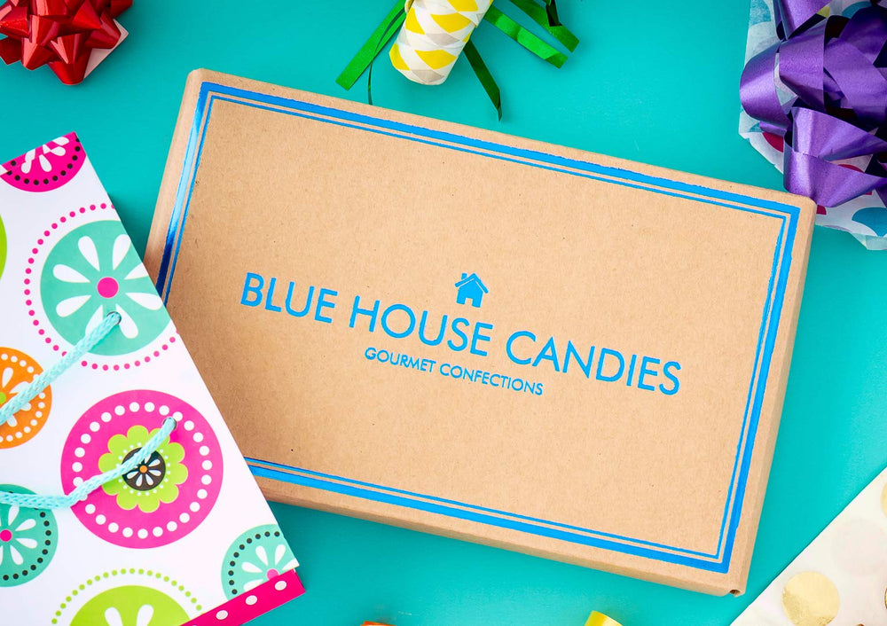 Blue House Gift Box presentation showing 20 caramels for celebrations.