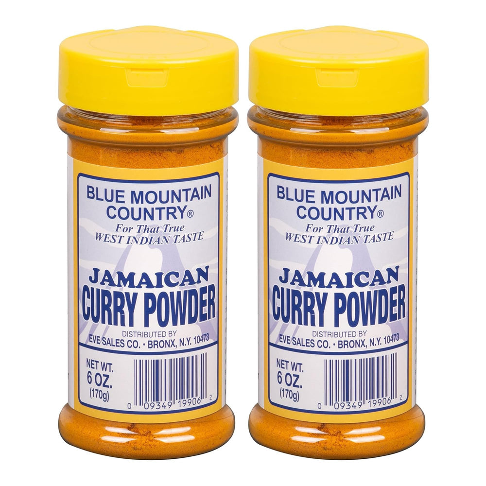 Blue Mountain Country Jamaican Curry Powder bottle pour for quick flavorful meals.
