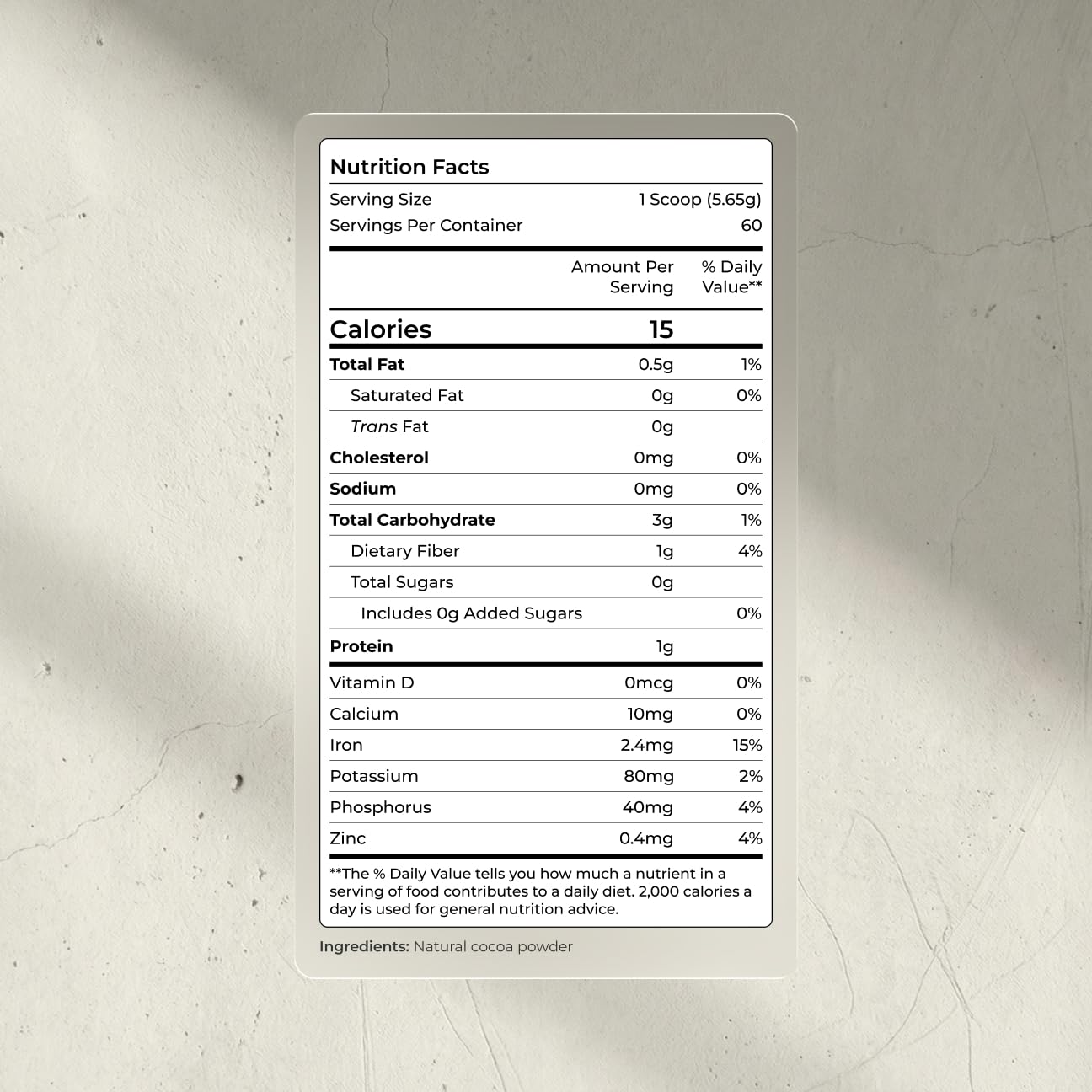 Blueprint Bryan Johnson cocoa powder jar closeup showing elite flavanols for daily wellness