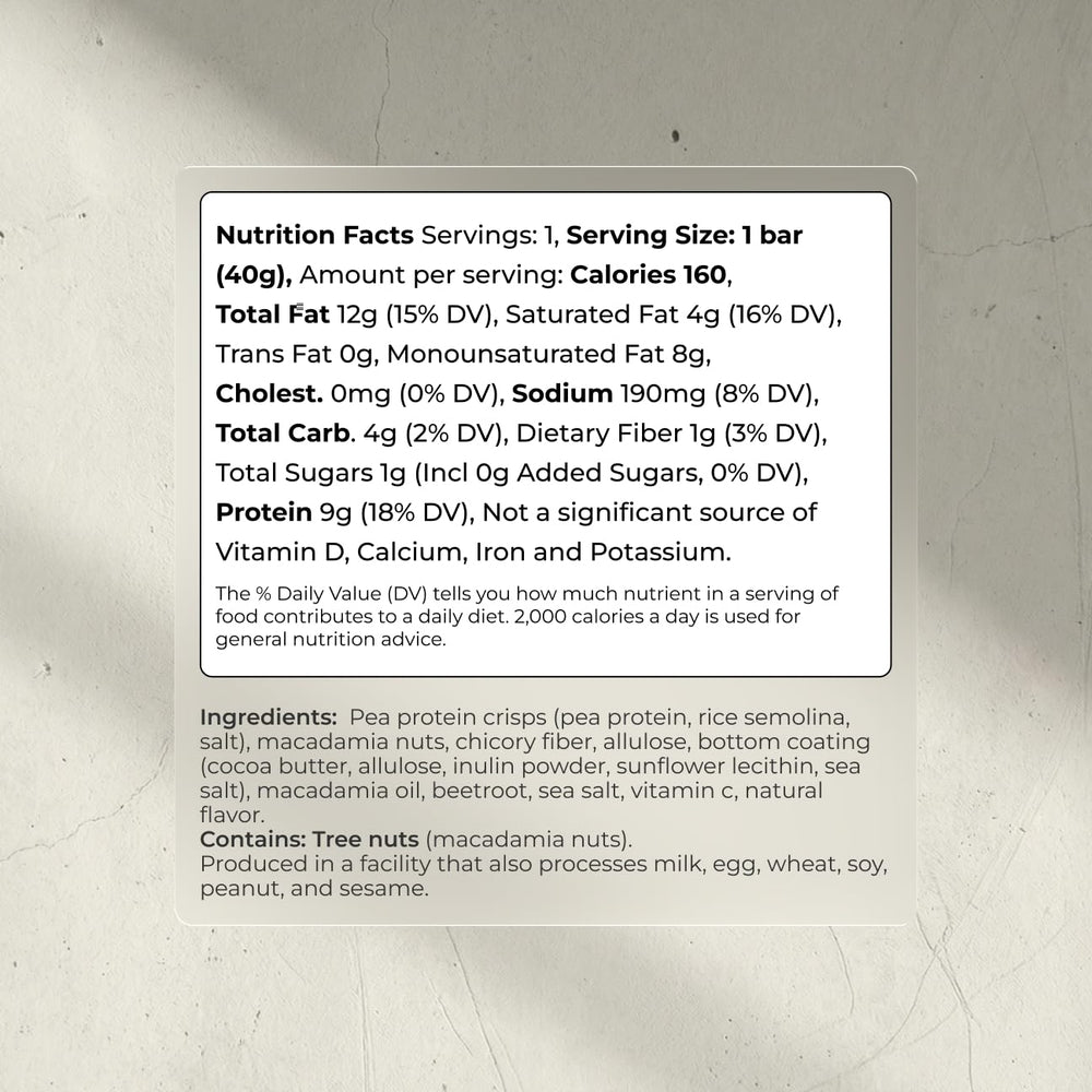Close-up of Blueprint Bryan Johnson raspberry macadamia bar ingredients showing clean protein