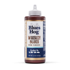 Blues Hog Whiskey Blues sauce bottle being poured for a glaze
