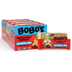 Close-up of Bobo's Cranberry Orange Oat Bar showing chewy texture with cranberry bits.