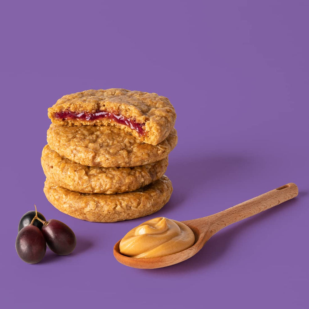 Bobos Grape PB&J oat bar on desk, a handy gluten-free lunch boost