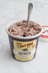 Close-up of blueberries in Bob's Red Mill oatmeal cup showing real fruit