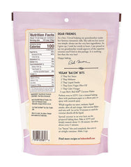 Bob's Red Mill coconut flakes added to granola bowl for texture