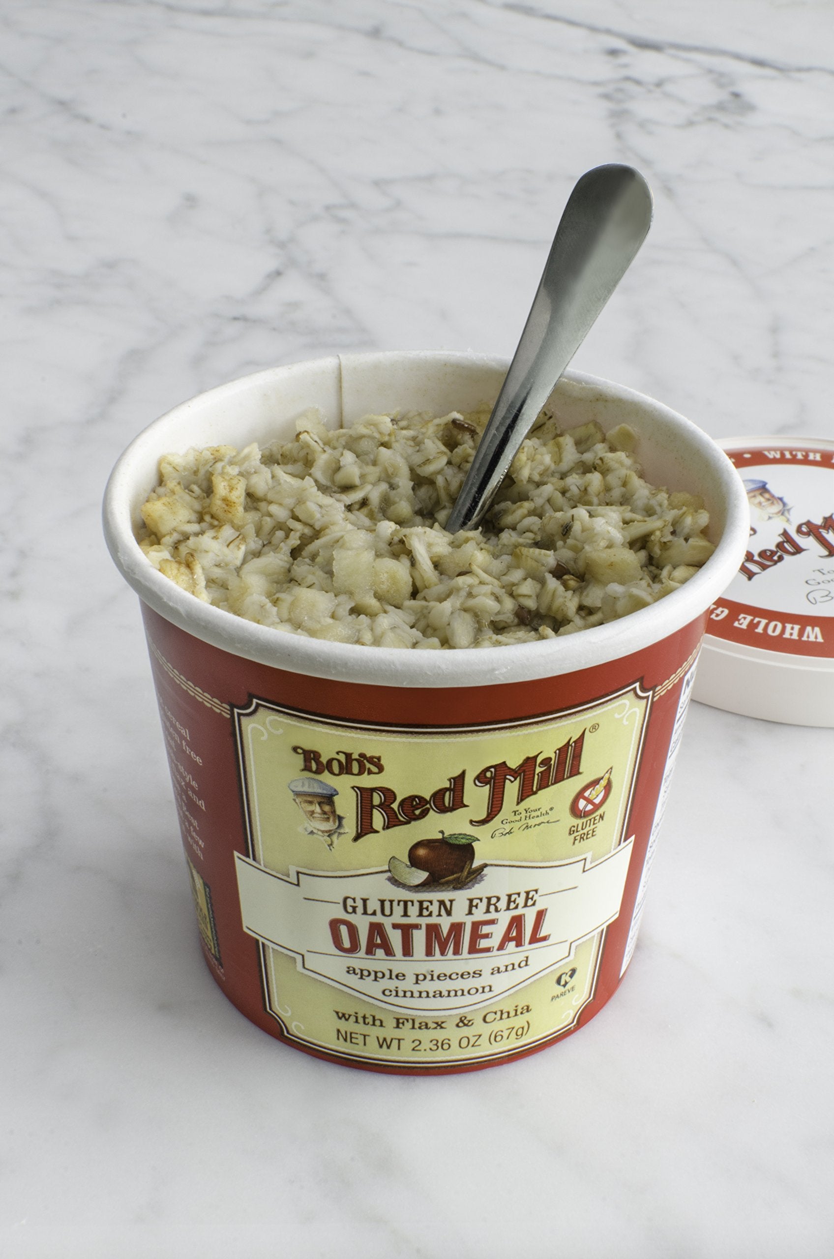 Bob's Red Mill GF Oatmeal Cup Apple & Cinnamon with flax seeds visible for added texture