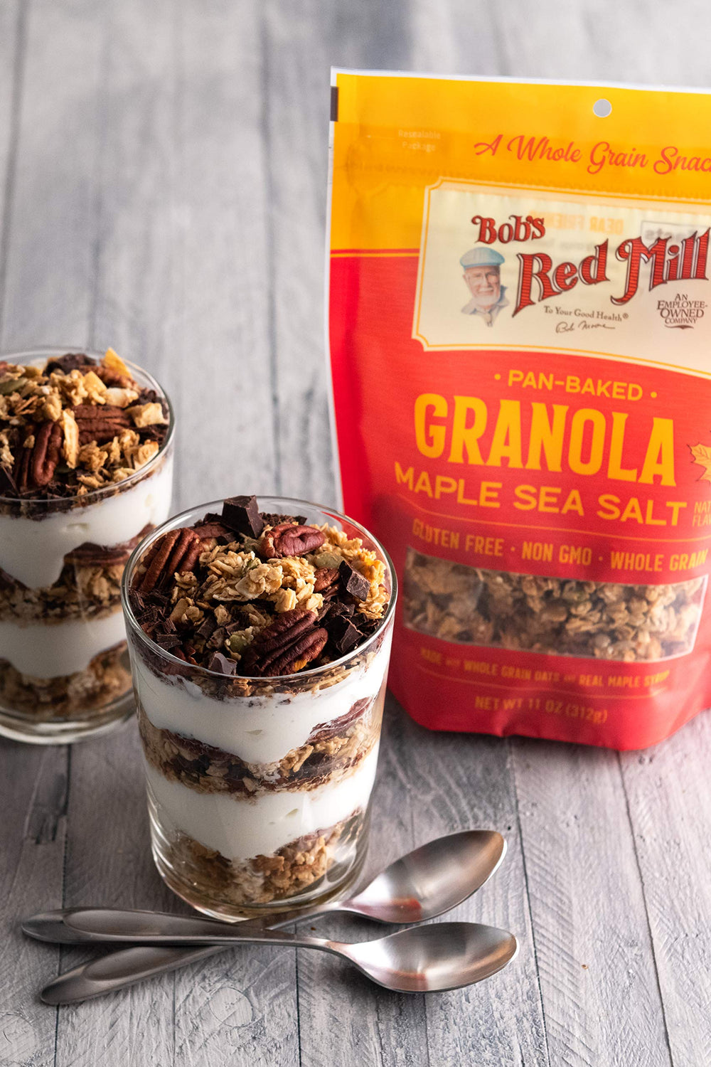 Bob's Red Mill Maple Sea Salt Granola ingredients closeup featuring oats seeds and maple syrup