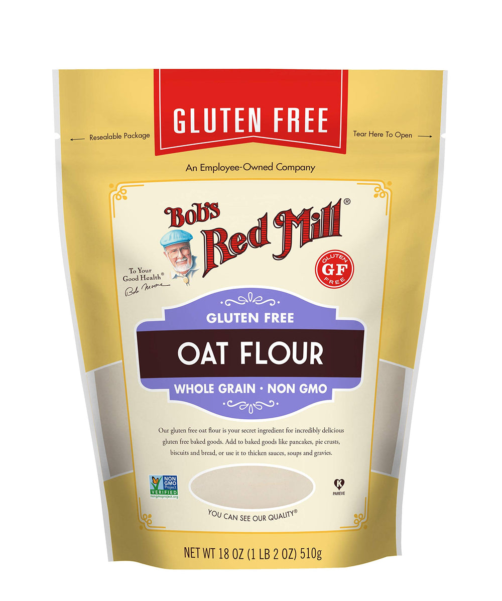 Close-up of oats in Bob's Red Mill flour highlighting whole grain quality.