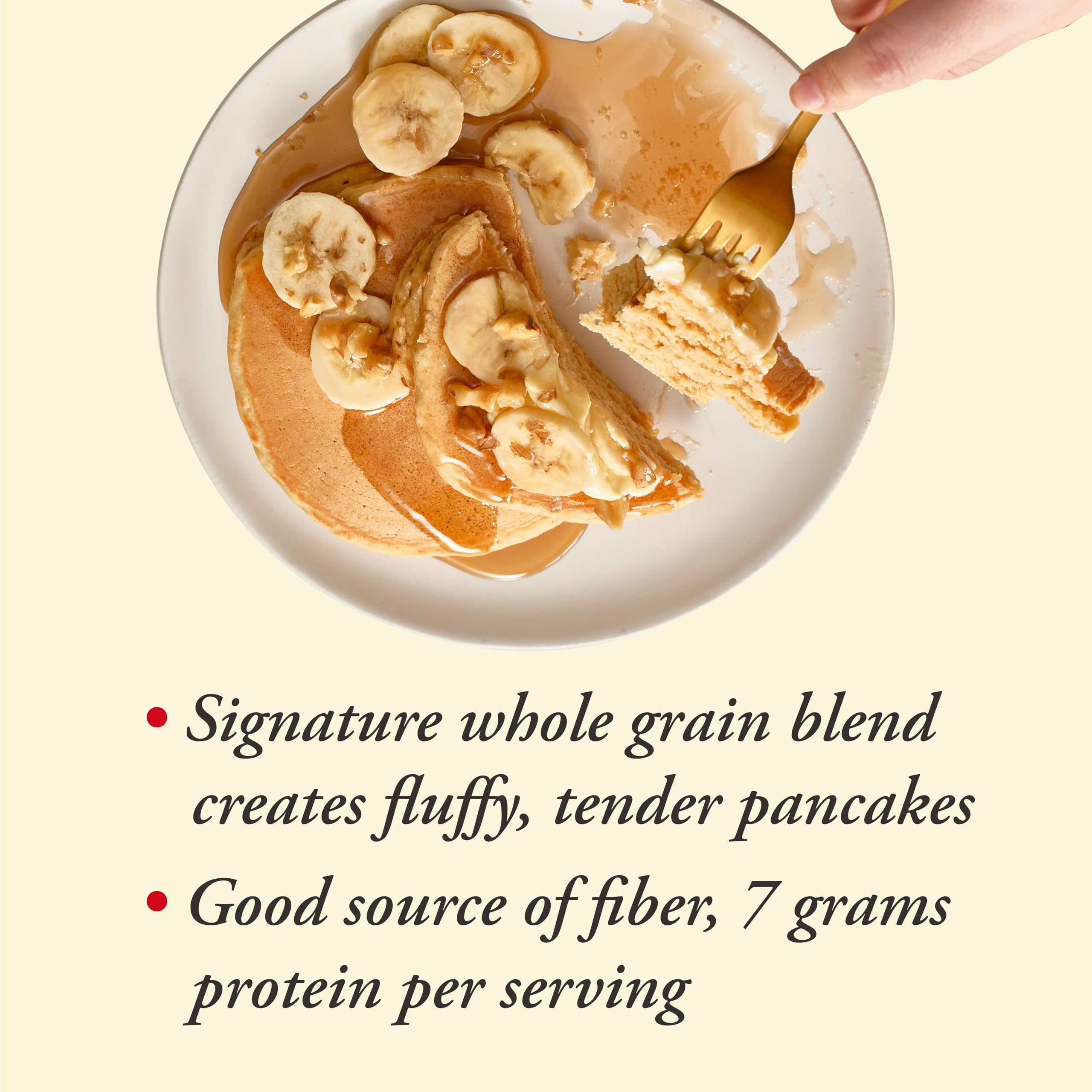 Stacked pancakes with butter and syrup ready to serve
