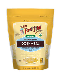 Bob's Red Mill Organic Medium Grind Cornmeal bag on shelf, ideal for baking