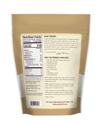Bob's Red Mill Organic Spelt Flour pouring into a mixing bowl for bread dough