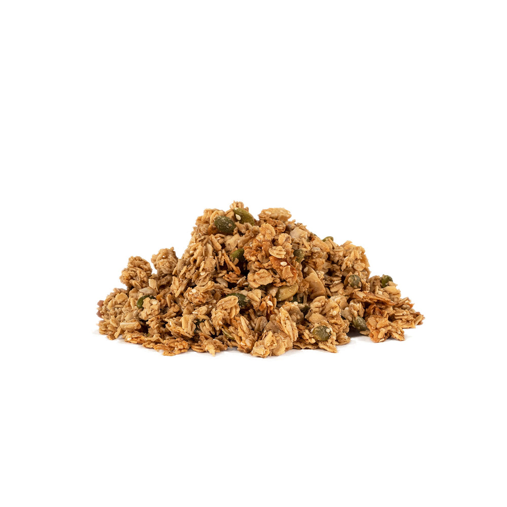 Bob's Red Mill granola closeup shows toasted oats with maple notes and salt crunch