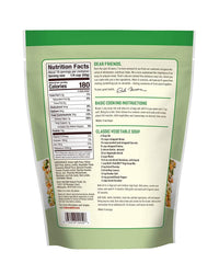 Close-up of green and yellow split peas, barley, lentils, and pasta in Vegi Soup Mix.