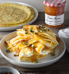 Close-up of Bonne Maman apricot preserves with whole fruit chunks