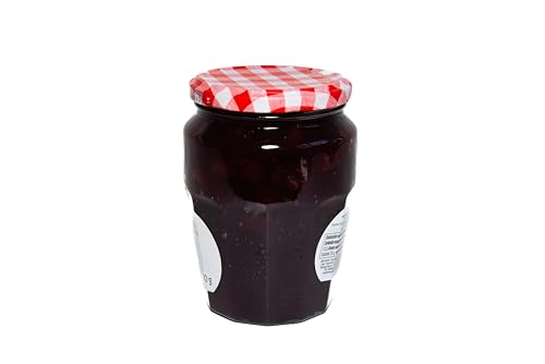 Bonne Maman Cherry Pie Filling being spooned onto a slice.