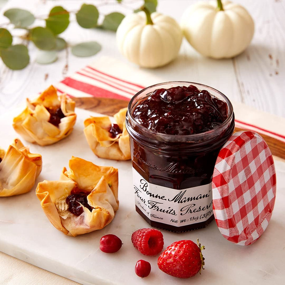 Bonne Maman Four Fruit Preserves cherry jar emphasizes bold flavor ideal on breakfasts.