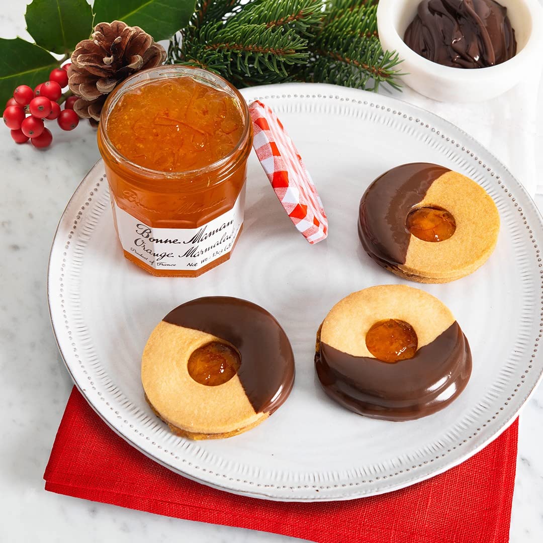Bonne Maman orange marmalade jars in a kitchen setting, ideal for adding citrus flavor.
