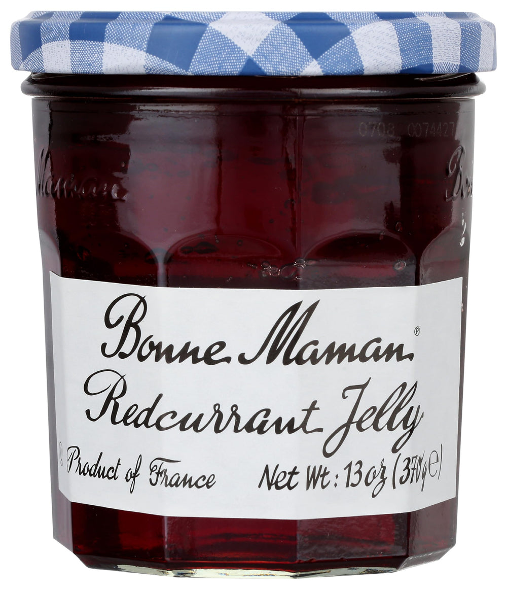 Bonne Maman Red Currant Jelly jar ready to spread on toast for breakfast.