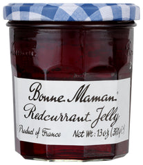Bonne Maman Red Currant Jelly jar ready to spread on toast for breakfast.