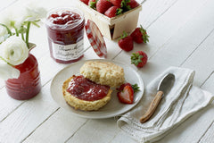 Bonne Maman Strawberry Preserves jar with ripe fruit chunks for breakfast.