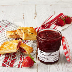 Bonne Maman preserves being poured over pancakes for a fruity finish.