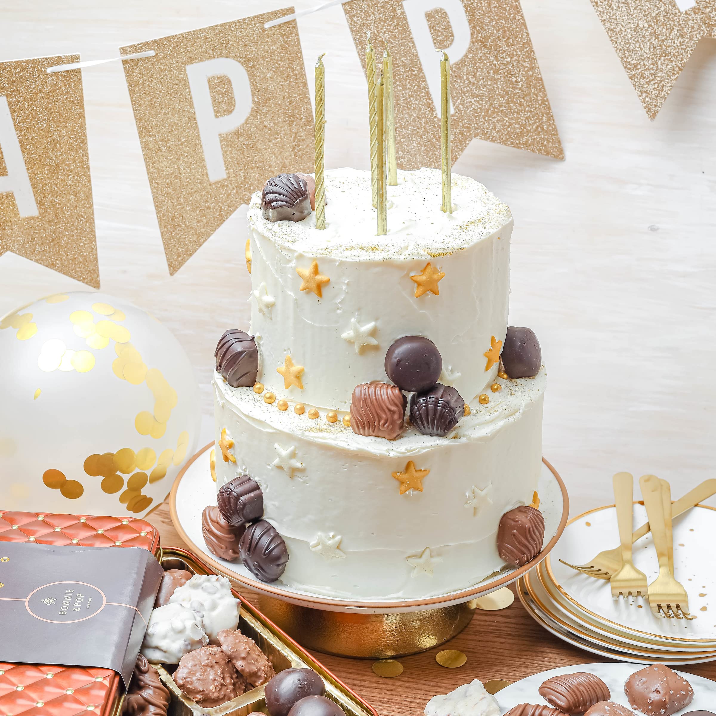 BONNIE AND POP Cashew clusters in chocolate, a shareable treat for gatherings.