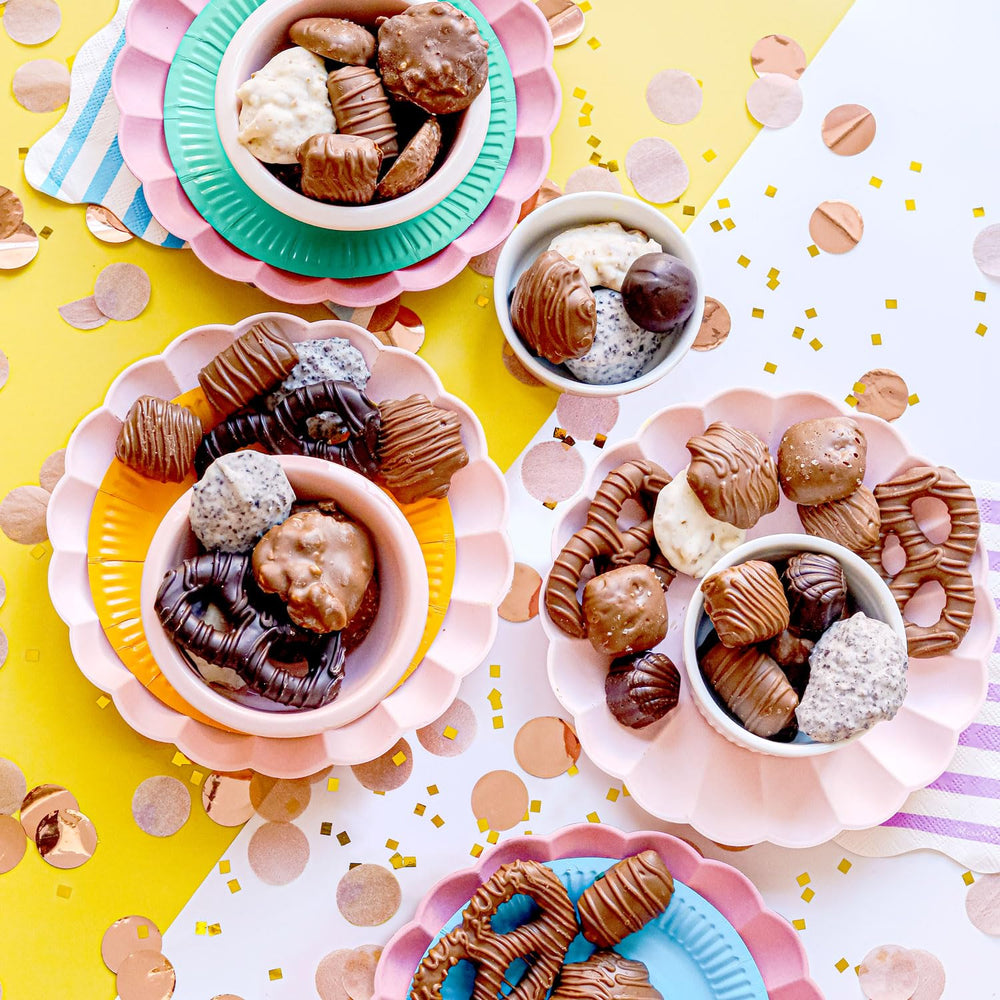 BONNIE AND POP Milk, dark, and white truffles in a rich assortment for indulgent moments.