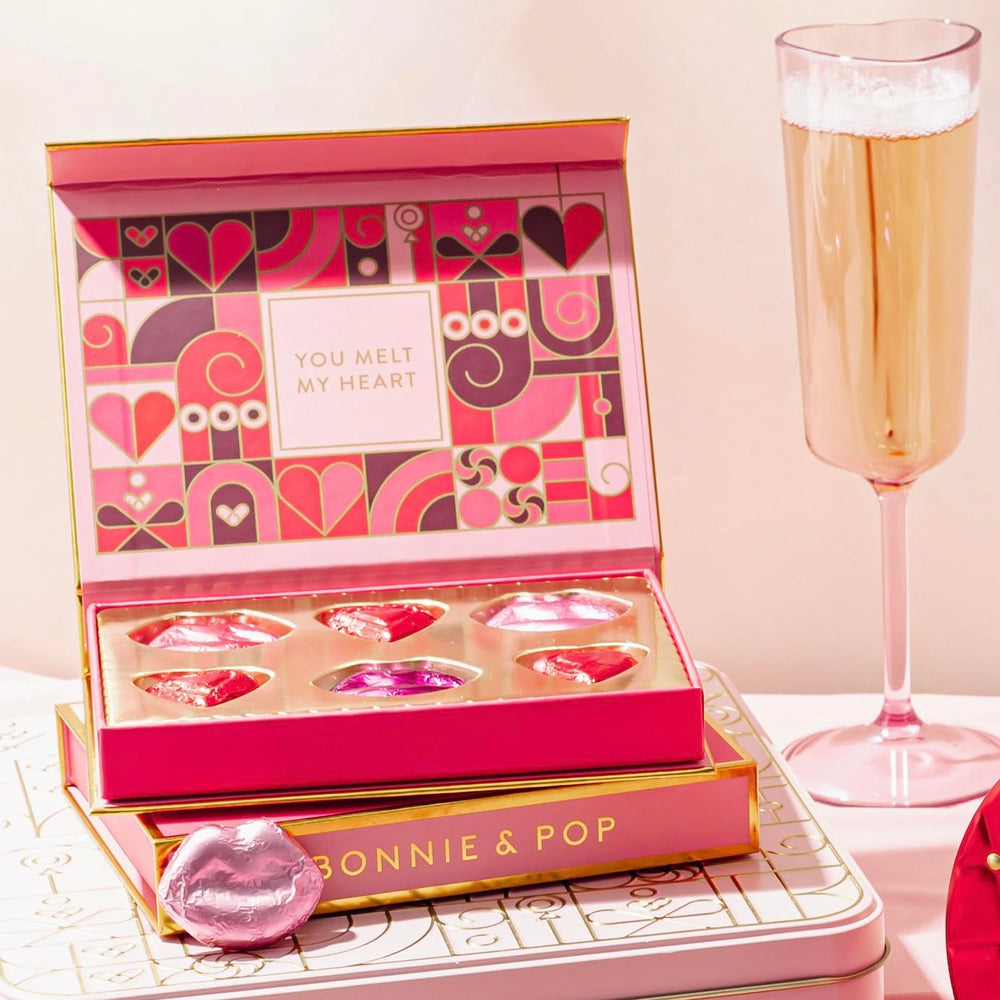 BONNIE AND POP romantic gift idea shown on a table with chocolates.